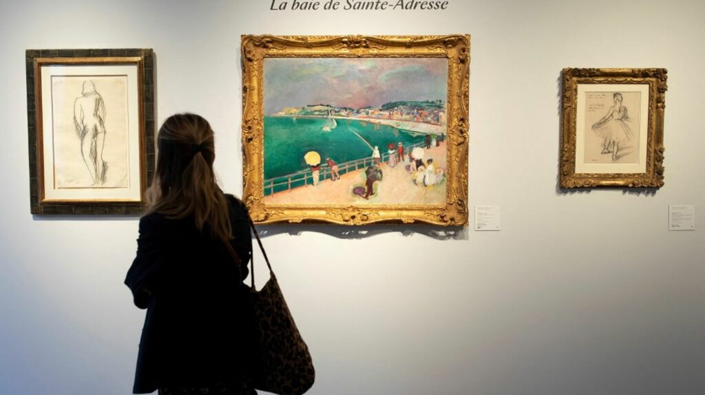 La vente de la collection Alain Delon rapporte plus de huit millions d'euros, deux fois l'estimation
              Le clou de la vente, "La baie de Sainte-Adresse", tableau de Raoul Dufy estimé entre 600 000 et 800 000 euros, a été adjugé pour 1 016 400 euros.