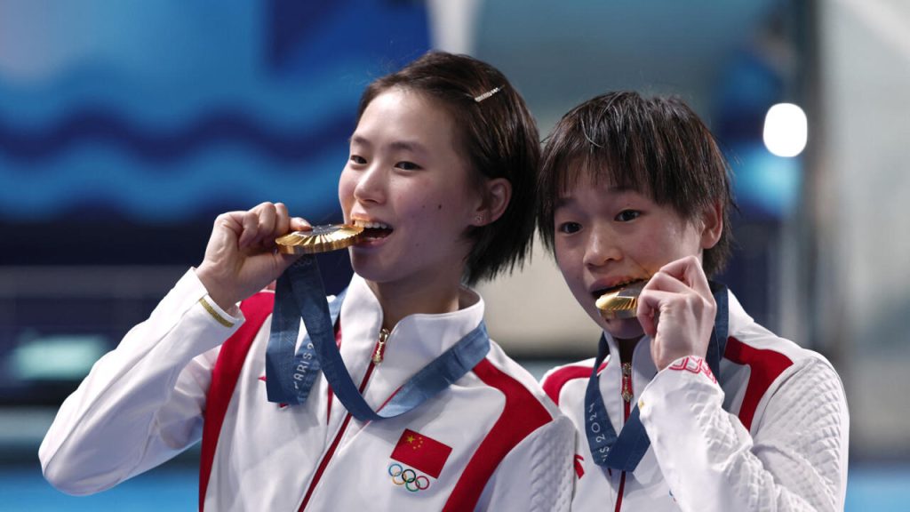 Des adolescents chinois plongent dans l'histoire olympique au Centre aquatique du peuple