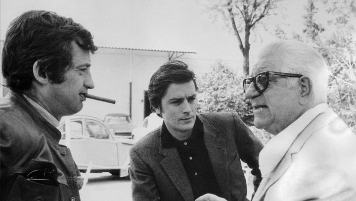 Jean-Paul Belmondo, Alain Delon et Jean Gabin, dans les années 1960 à Paris. (AFP)
